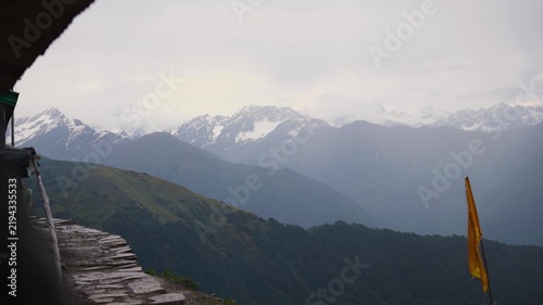 View of the Himalayan mountain range from the stone terrace of Rudranath Temple in Chamoli Uttarakhand