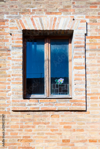 Принти на полотні window features stained glass with a floral design.