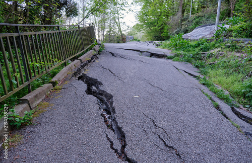 A section of road destroyed by a landslide. Natural disaster.