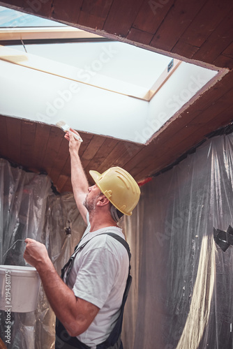 House painter working on a home renovation.