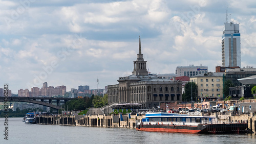Obraz na płótnie River station. A building on the riverbank.