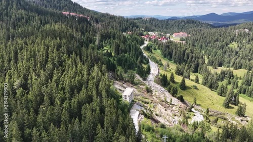 Aerial view of a landslide and terrain erosion near mountain resort