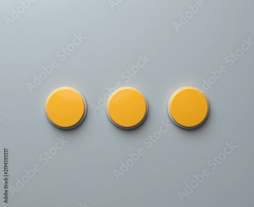 Three yellow round buttons or dots aligned horizontally on a light gray background.