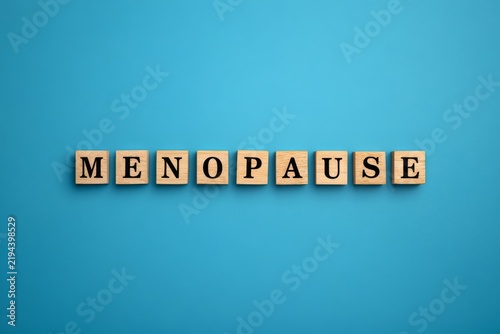 Menopause concept with wooden letter tiles