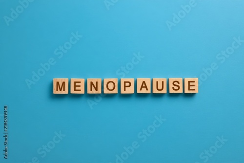 Menopause concept with wooden letter tiles
