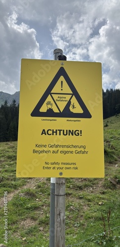 Alpine Dangers Warning Sign for Hikers in the Mountains