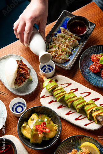Savoring Vibrant Flavors at a Modern Asian Cuisine Restaurant in a Lively Evening Setting
