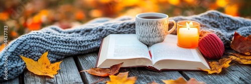 Open Book Coffee Cup Knitted Blanket And Candles On A Snowy Or Dry Winter Woody Texture Backdrop.