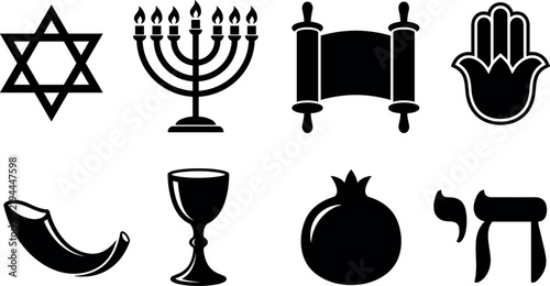 Set of jewish religious symbols including star of david, menorah, torah scroll, hamsa, shofar, kiddush cup, pomegranate and chai