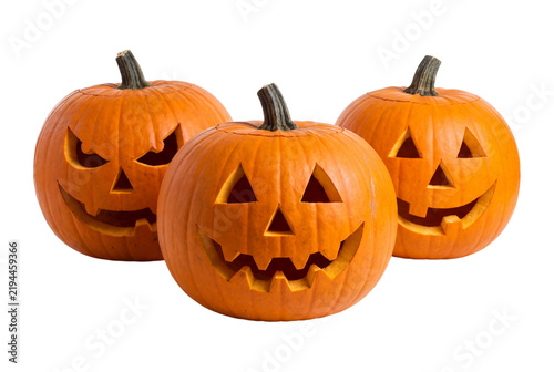 Three carved Halloween pumpkins isolated on transparent background