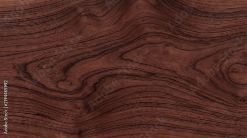 Dark brown walnut wood grain texture featuring natural organic flowing lines and swirling patterns crafted from a high quality polished hardwood surface for elegant interior designs