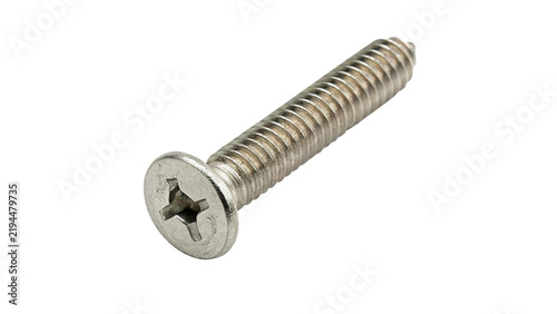 Fotografie Metallic countersunk flat head screw bolt isolated on dark background