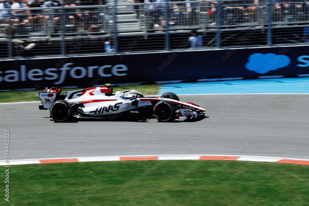 Obraz premium May 24, 2026, Montreal, Canada, Esteban Ocon races a Haas F1 car at Circuit Gilles-Villeneuve. g