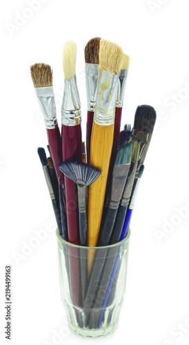 used art brushes in a glass,