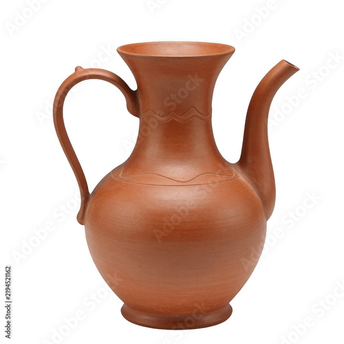 Traditional handcrafted brown clay pitcher for water or wine service