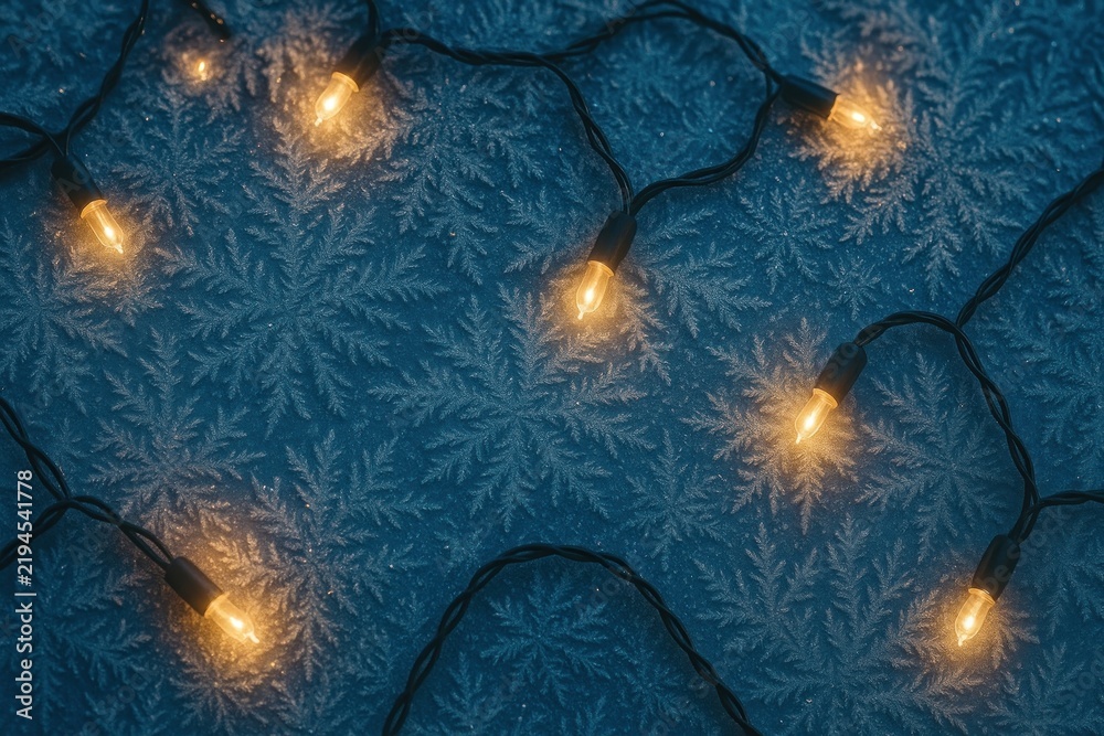 Naklejka premium Warm lights on frosty pattern