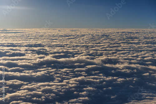 Fotografie Altocumulus undulatus cloud in a morning over Japanese sea.