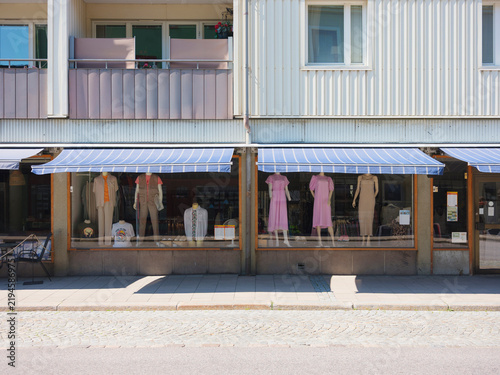 Clothing store under apartments in street