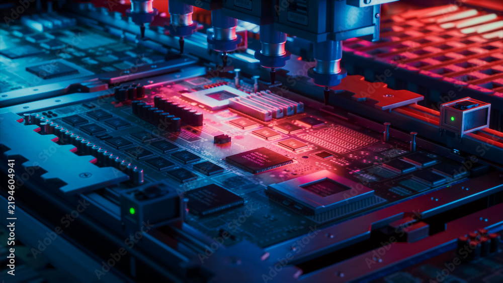 Obraz premium Automated Placement Machine Fits Processors and Memory Modules Onto a Motherboard Bathed in Red and Blue Light, Illustrating Driverless Electronics Production Inside a Computer Hardware Factory.