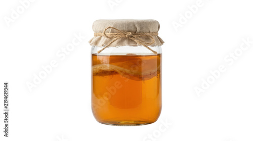 Glass Jar of Kombucha with SCOBY and Cloth Cover