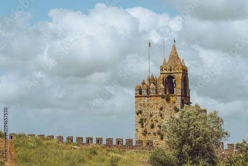 Obraz na płótnie The historic medieval Castle of Montemor-o-Novo in Portugal under a dramatic cloudy sky