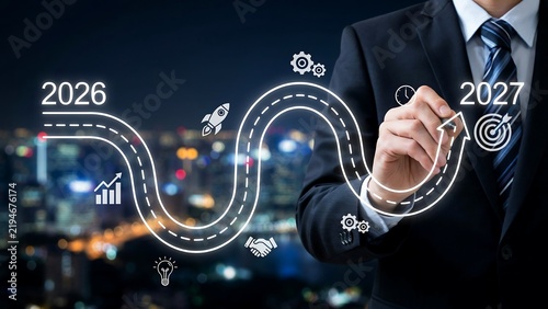 Business professional drawing future growth roadmap between years 2026 and 2027