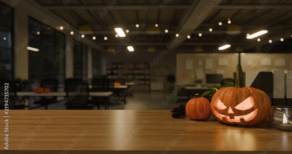 Obraz premium 3D Illustration of Halloween Decoration with Jack o Lantern on Office Desk at Night