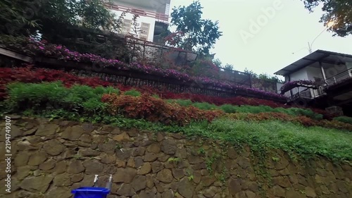 Static view of wooden stairs and terraced garden landscape