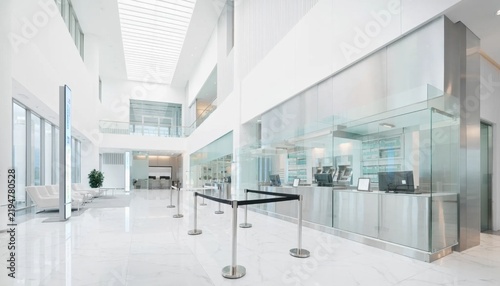 Modern Airport Check-In Area with Transparent Glass Counters and Bright Interior