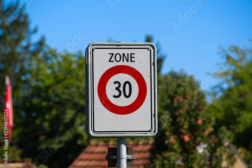 Close-up of Zone 30 traffic sign at Swiss city of Zürich on a sunny late summer day. Photo taken September 15th, 2026, Zurich Schwamendingen, Switzerland.