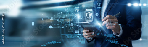 Konstfotografi Security specialist working on tablet implementing strict Mobile Security protocols, preventing wireless data breaches, encrypting cellular data channels, and auditing device permissions