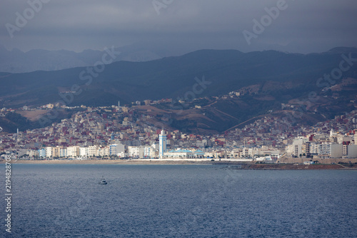 Distant view of Fnideq Castillejos Moroccan coastal town across the sea from Ceuta