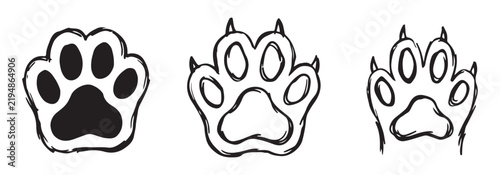 Set of sketch style animal paw prints with claws for nature themed artistic background art.