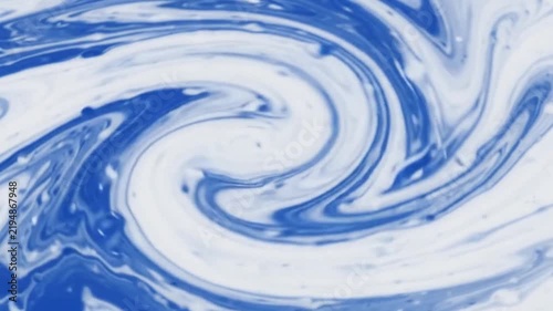 blue and white liquid swirling together in a dynamic, mesmerizing vortex pattern, creating a fluid art background.