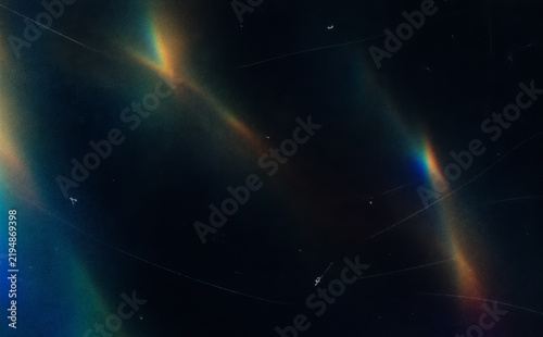 Subtle Prismatic Glow Across Dark Abstract Light Background