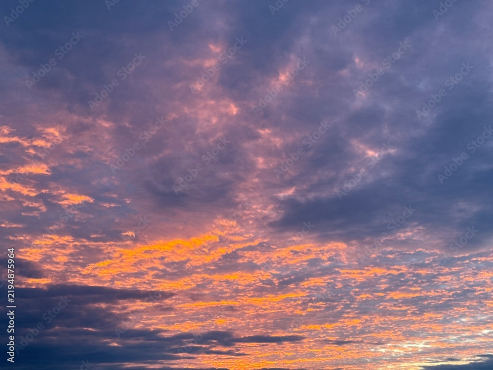 Fototapeta premium Fantastic sunset sky, colorful clouds, natural sunset sky background
