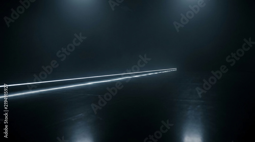 Cinematic horizontal light streak glowing across a dark empty room with reflections on black floor, minimalist futuristic background for high-tech concept, mystery and speed aesthetic.