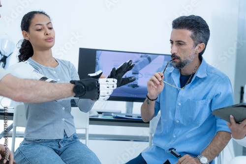 Foto Bio-robotics laboratory: a black and white robotic hand is stretched out to its