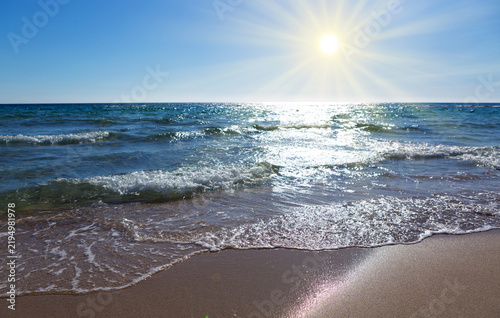 Фотография Sun beach with blue sky and turquoise water,as holiday summer background