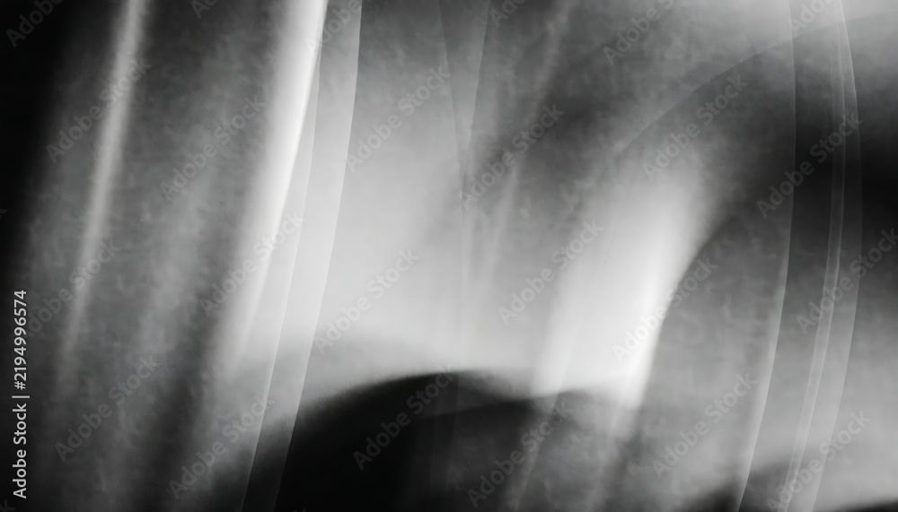 Obraz premium Abstract grayscale background with blurred motion and indistinct human form