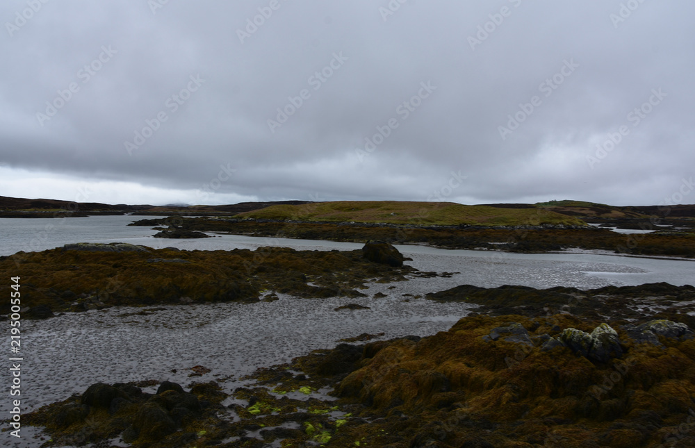 Obraz premium Dramatic Clouded Skies Over Remote Outer Hebrides Landscape