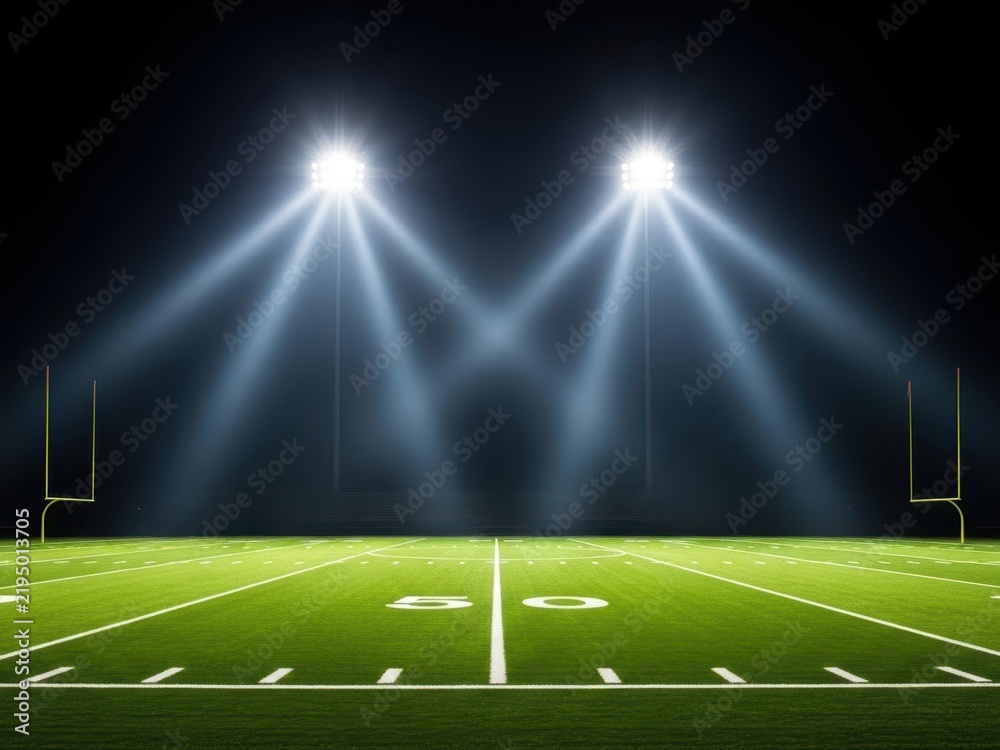 Obraz premium Empty football field under stadium lights at night