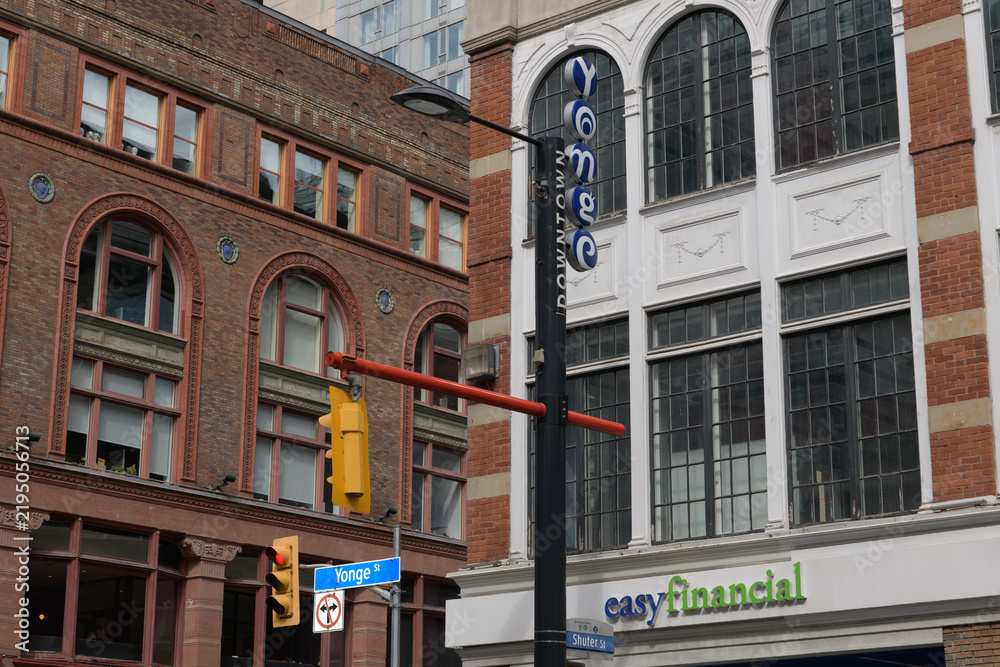 Obraz premium exterior of historic Ryrie Building and John E. Thompson Block, location of easyfinancial Services, a loan agency, located at 221 Yonge St, Toronto