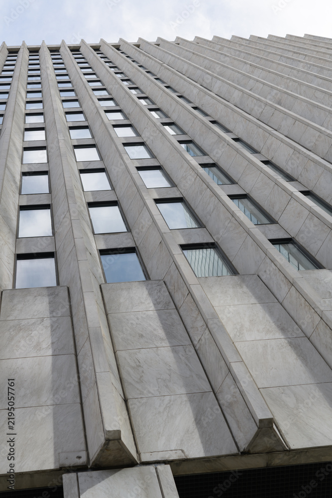 Obraz premium an oblique skyward view of Canada Trust Building designed by Crang & Boake completed in 1968, located at 110 Yonge St (Adelaide St side), Toronto