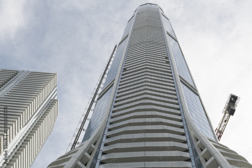 Obraz premium (at left edge) The Prestige and an upward view of SkyTower at Pinnacle One Yonge, Toronto