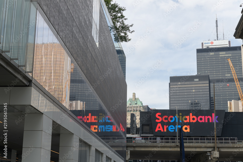 Fototapeta premium looking north from Harbour St to colorful sign on the south facing side of Scotiabank Arena near Bay St, Toronto