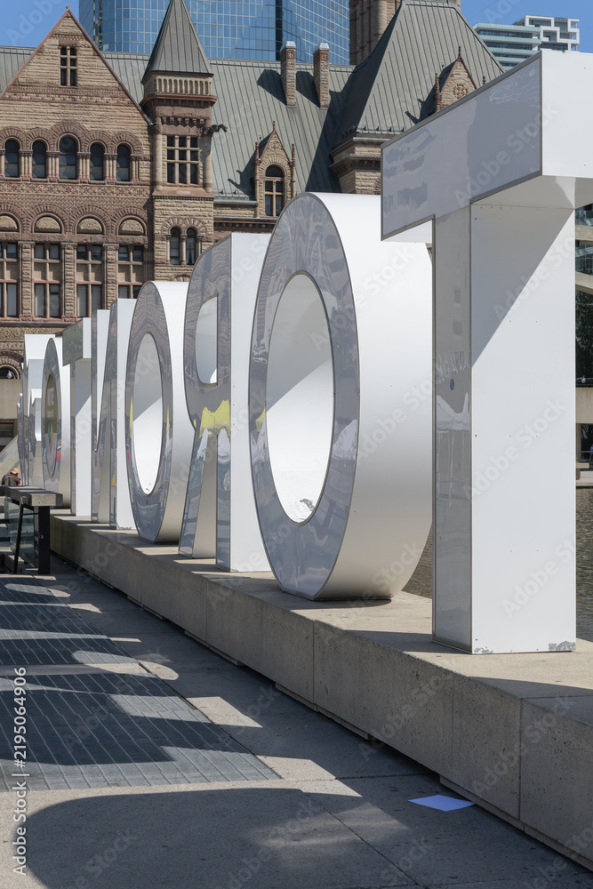 Obraz premium rear of 3d Toronto Sign at Nathan Phillips Square, City Hall, located at 100 Queen St W - late summer