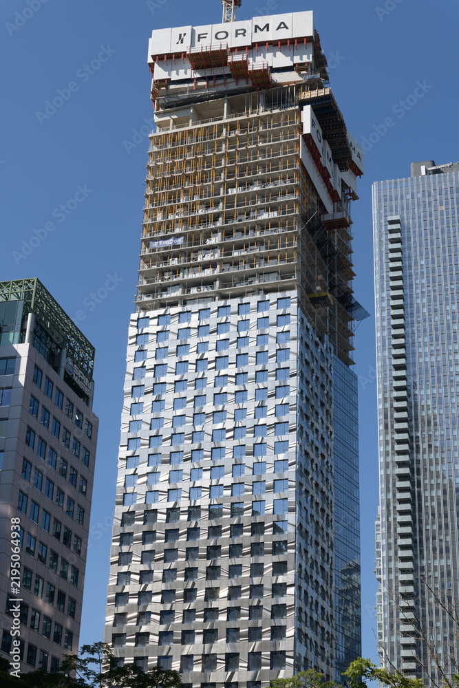 Obraz premium East Tower of FORMA Condos 260 King St W, Toronto - designed by Frank Gehry and David Mirvish, developed by Great Gulf, Dream Unlimited, Westdale Properties