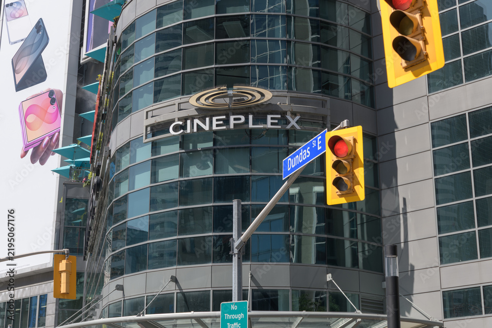 Fototapeta premium exterior glass and steel facade and sign of Cineplex Cinemas Yonge-Dundas and VIP located inside The Tenor building at 10 Dundas St E, Toronto
