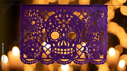 Deep Purple Papel Picado Skull Banner with Warm Candle Bokeh